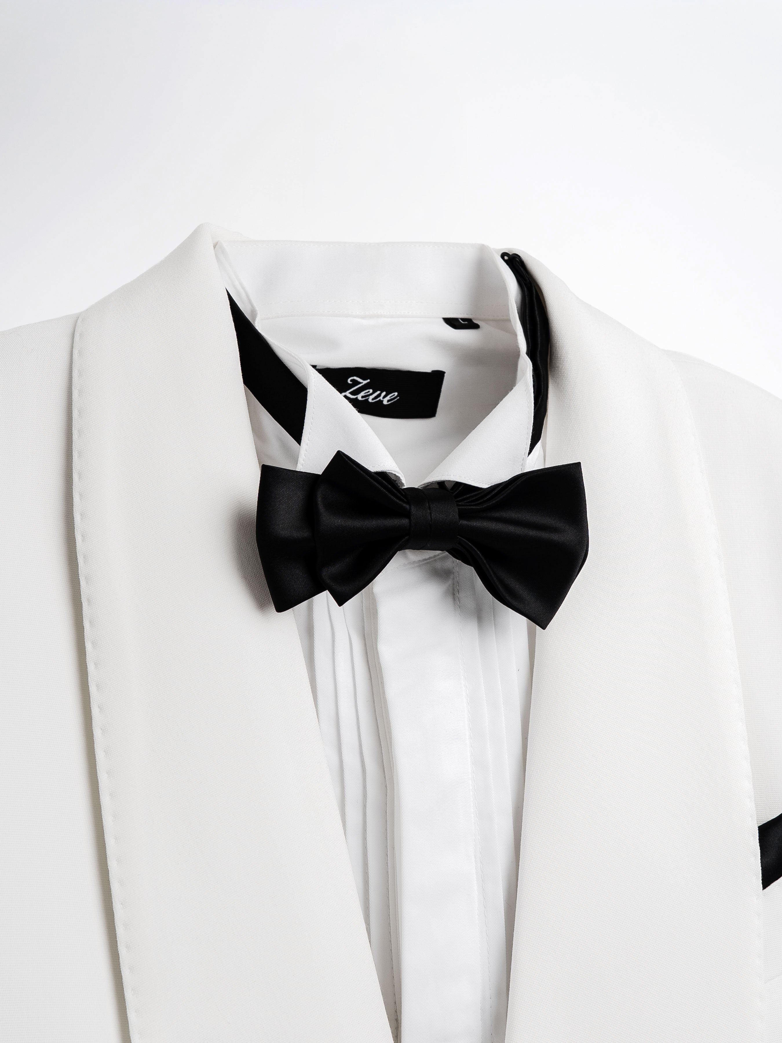 White tuxedo jacket with black satin lapels and bow tie, formal men's wear