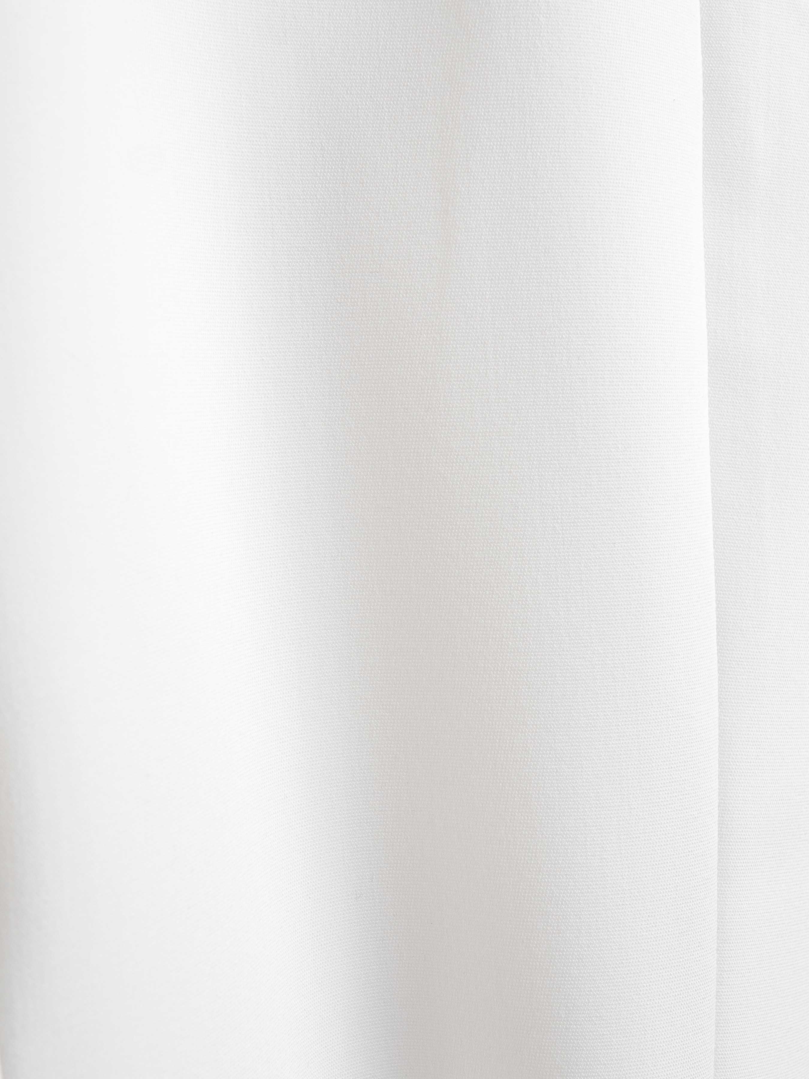 White men's dress shirt fabric close-up, smooth texture for formal wear