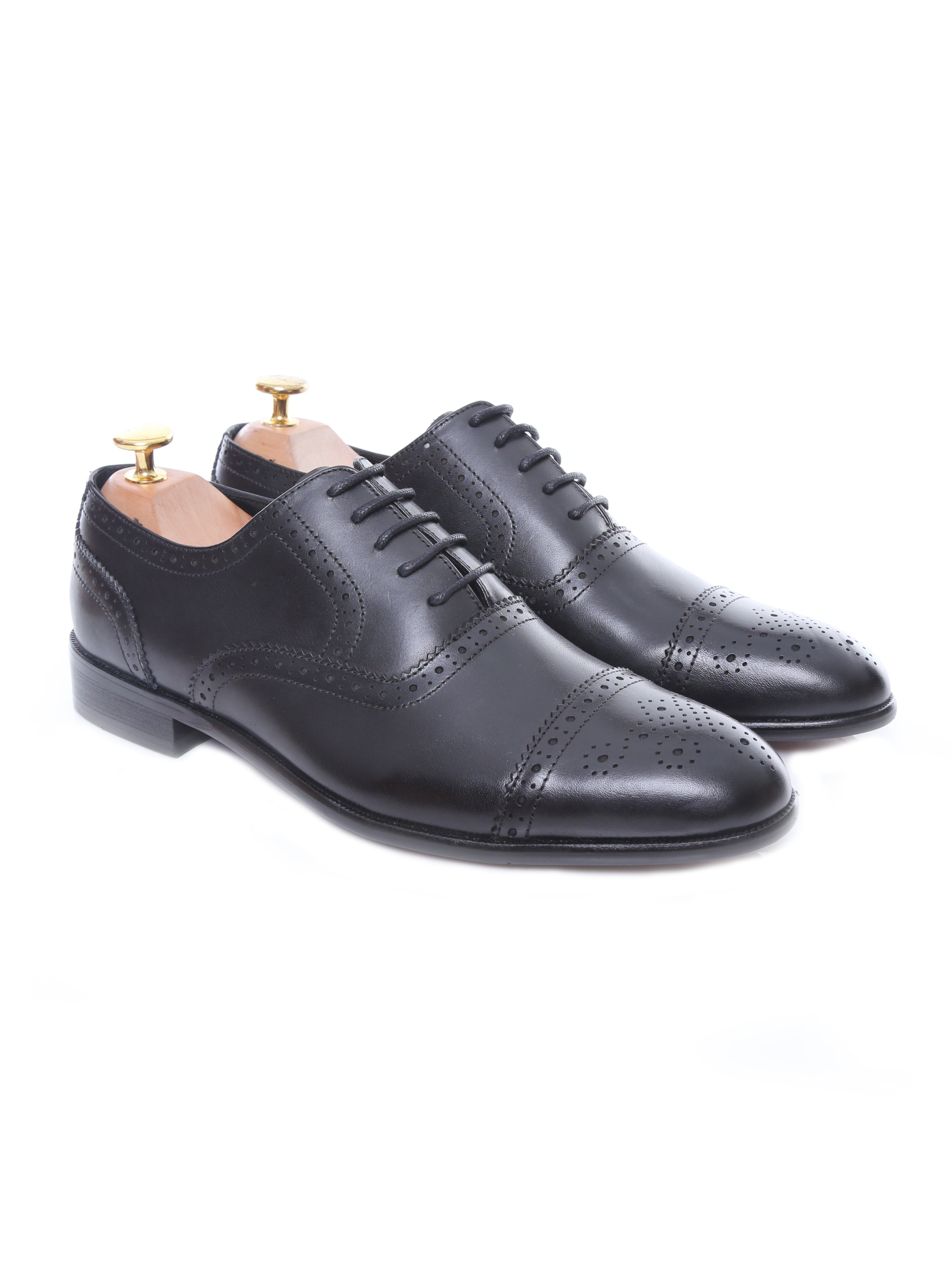 Black leather men’s oxford dress shoes with brogue detailing and lace-up design