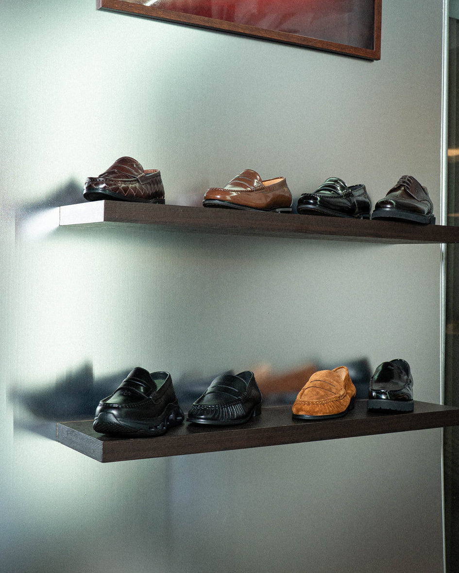 Selection of ZEVE loafers displayed at the anniversary event