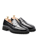 FrontPennyLoaferBlackEvaCombat_e64011f9-bb1d-41ab-95d1-c5004767e95a - Zeve