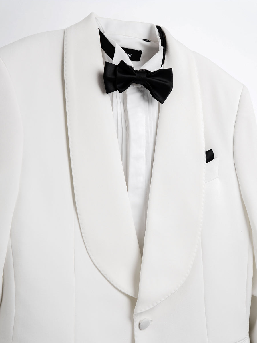 White tuxedo jacket with black bow tie and satin lapels for formal men's wear
