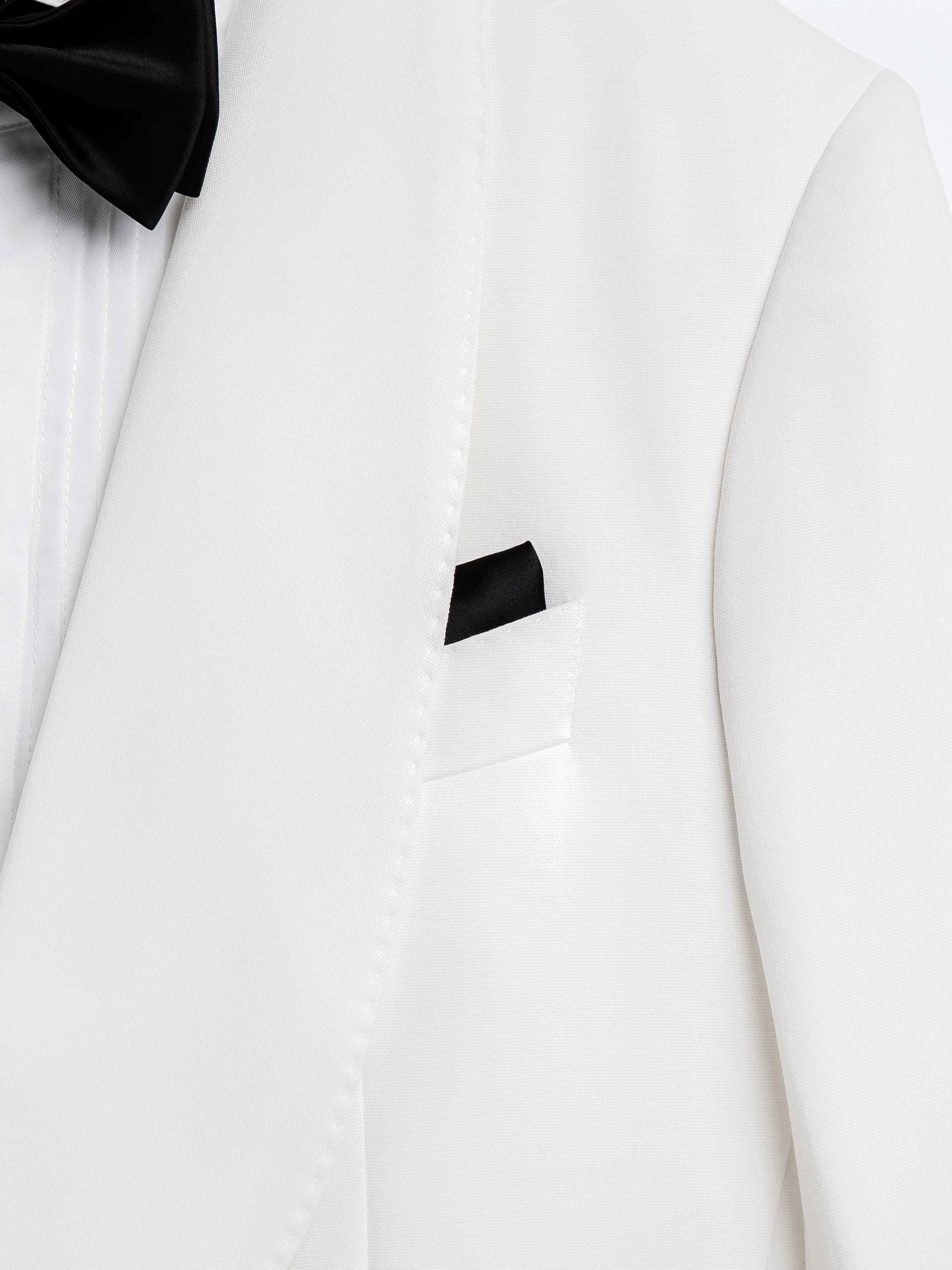 White formal suit jacket with black bow tie and pocket square, elegant men's attire