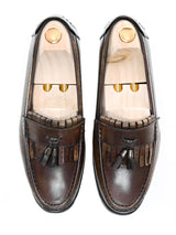 Men's handmade brown leather fringe loafers with tassels and wooden shoe trees