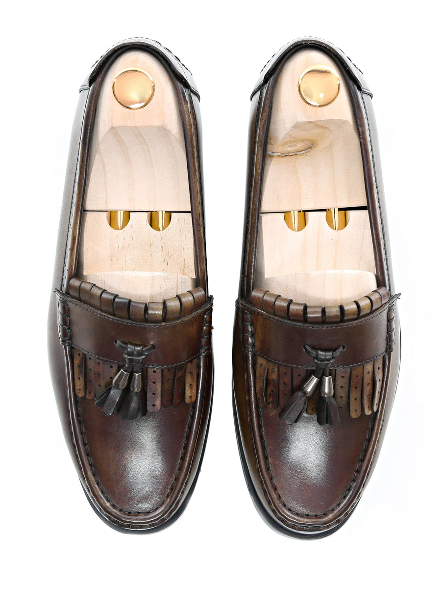 Men's handmade brown leather fringe loafers with tassels and wooden shoe trees